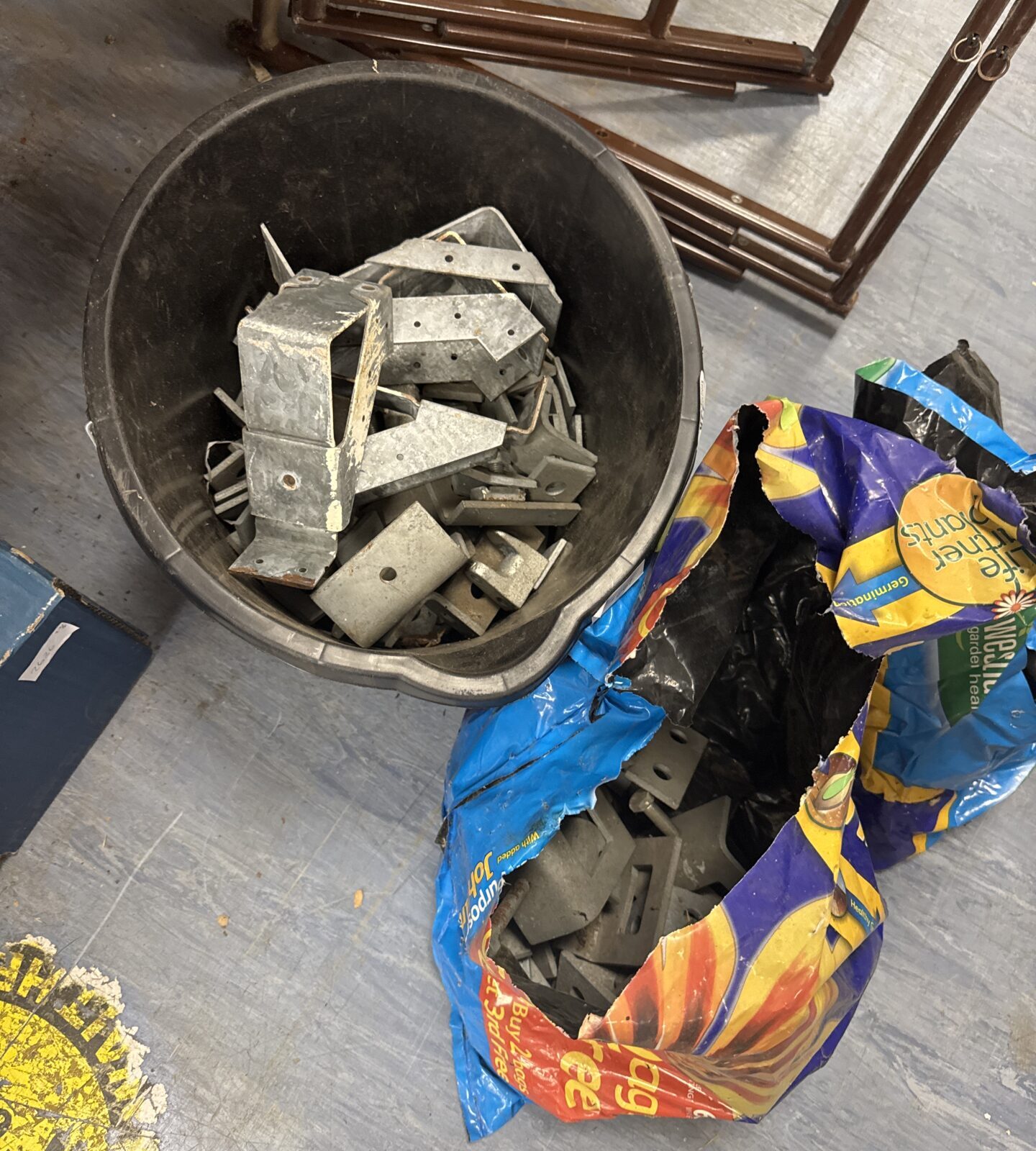Bucket & bag of joist brackets & others