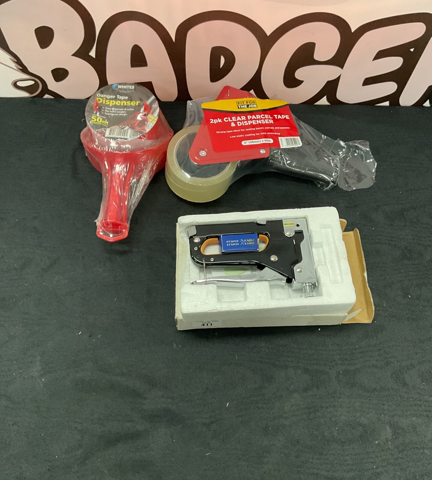Two tape dispensers and stapler