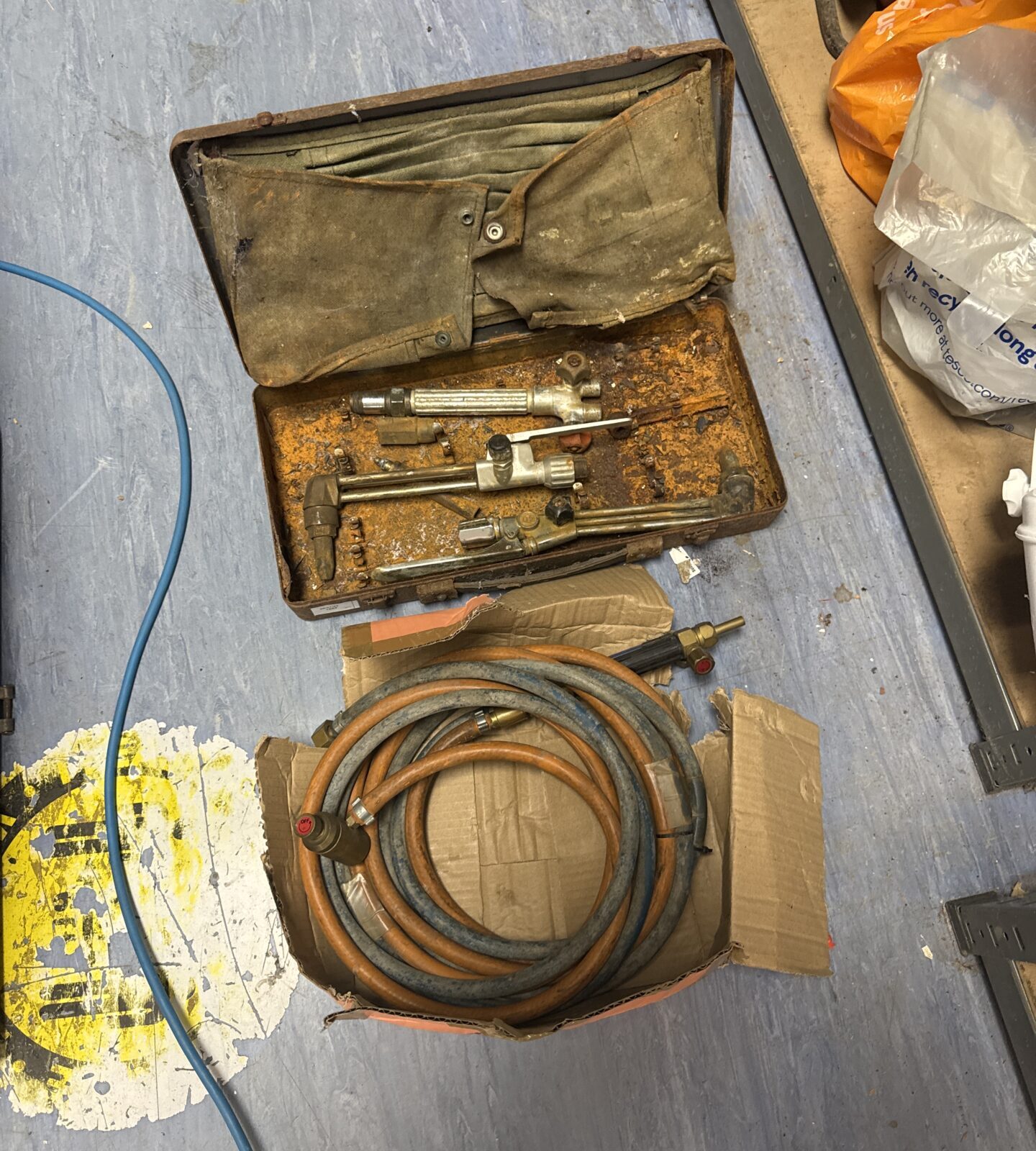 Three acetylene torches & a hose