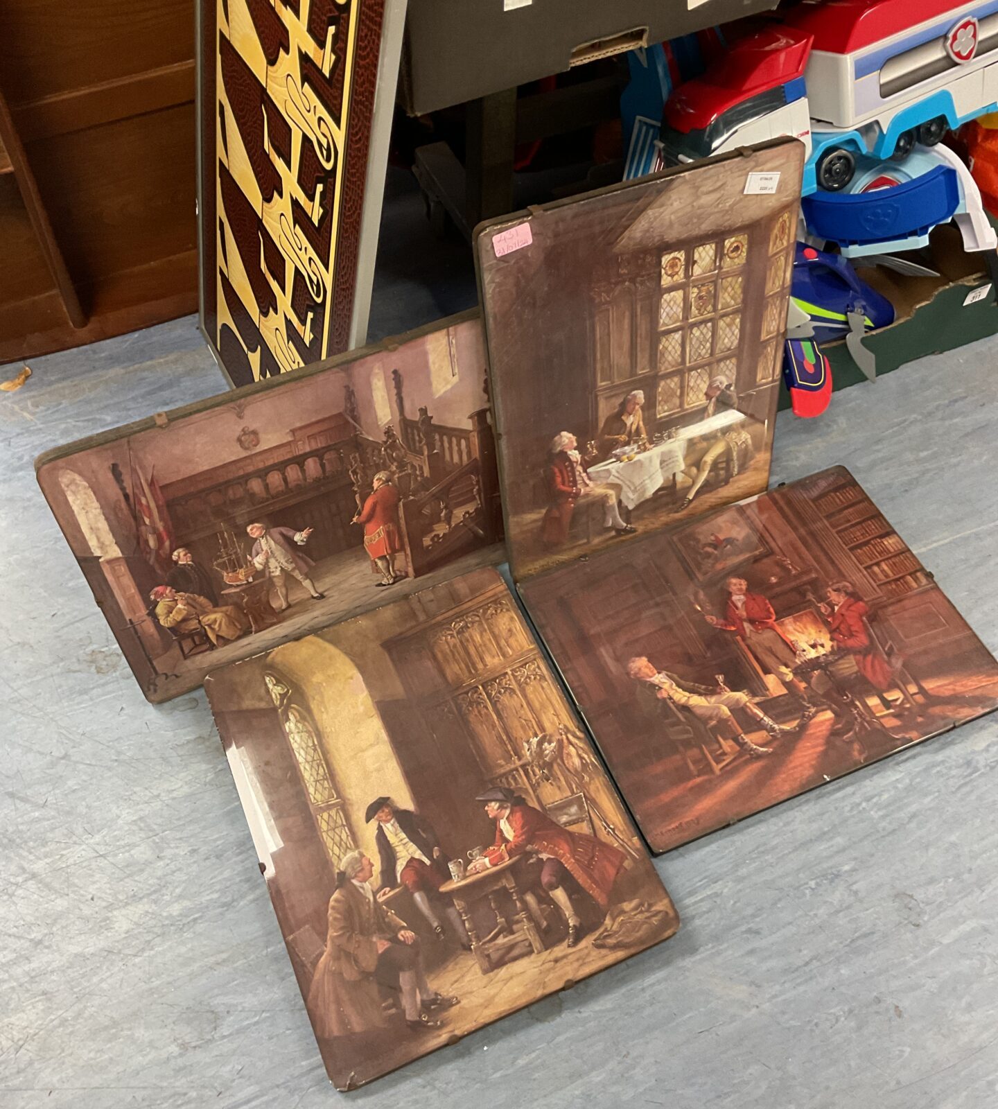 Set of four E m bennett classical scene prints on board