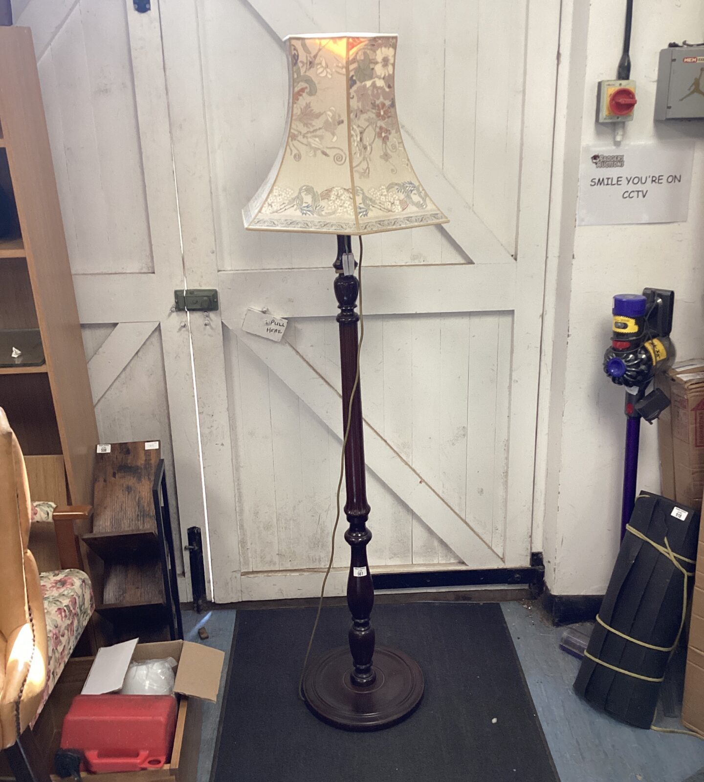 Wooden standard lamp with floral shade