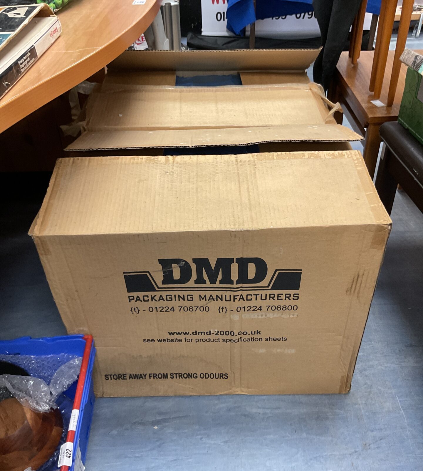 Two boxes of dmd food containers