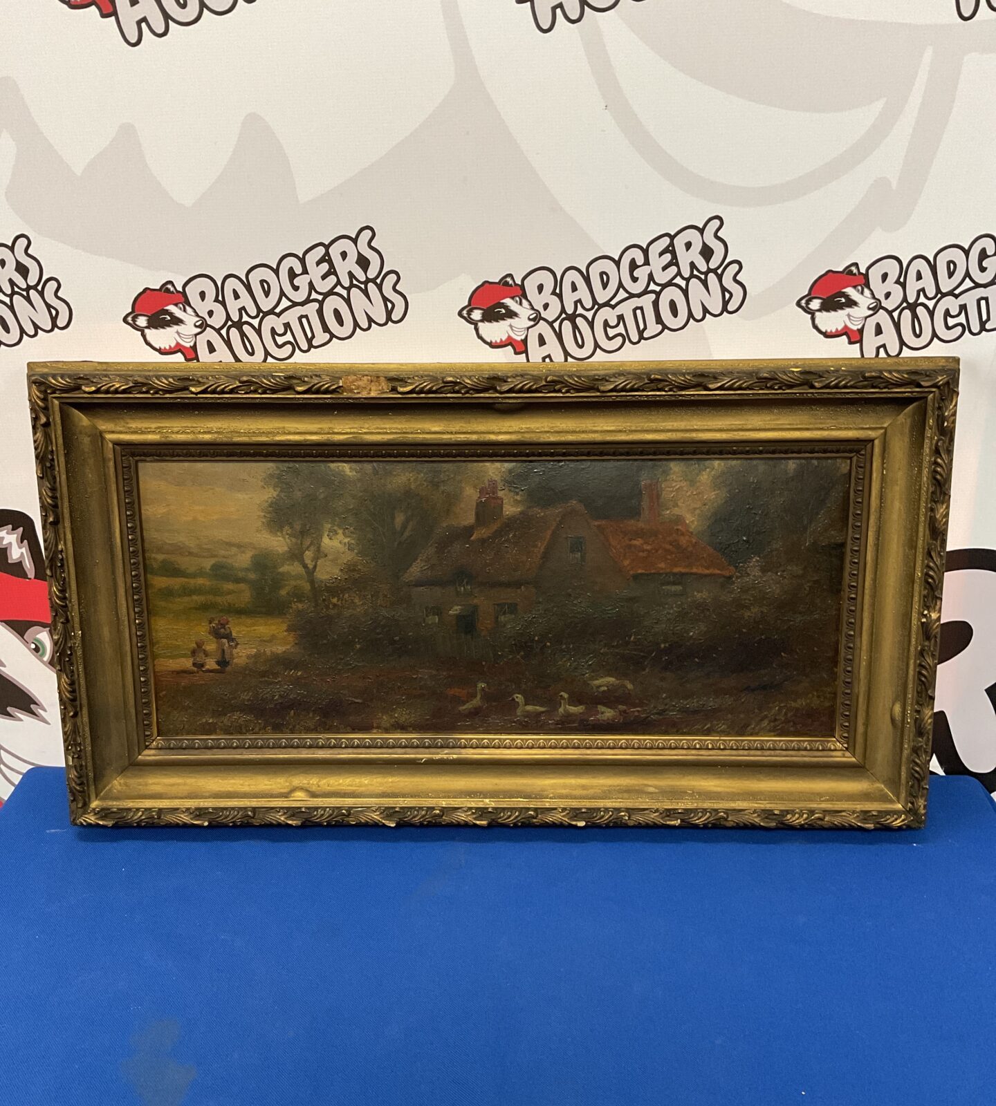 19th century gilt framed oil on canvas of country scene with figures, geese & cottage