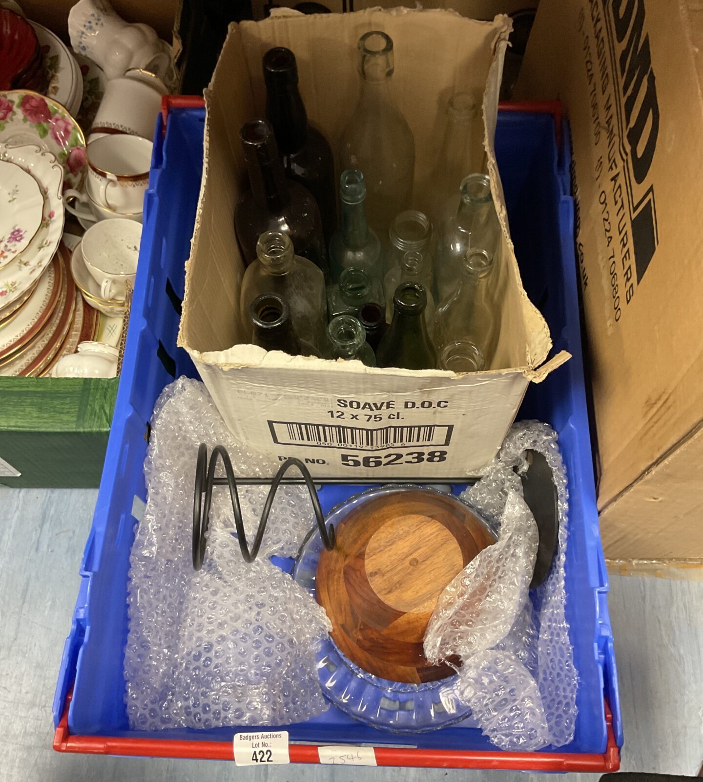 Crate of mixed inc empty glass bottles and crystal cake stand