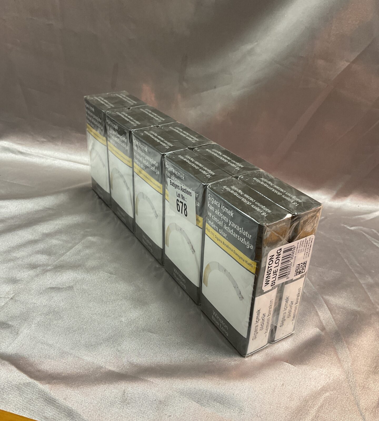 Ten sealed packs of Winston blue long Cigarette s