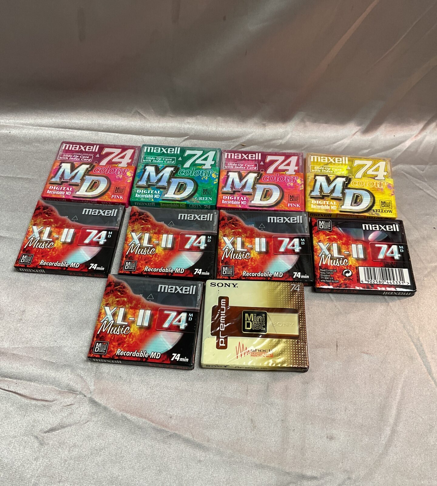 Ten new sealed mini discs nine Maxell 74 and one Sony 74