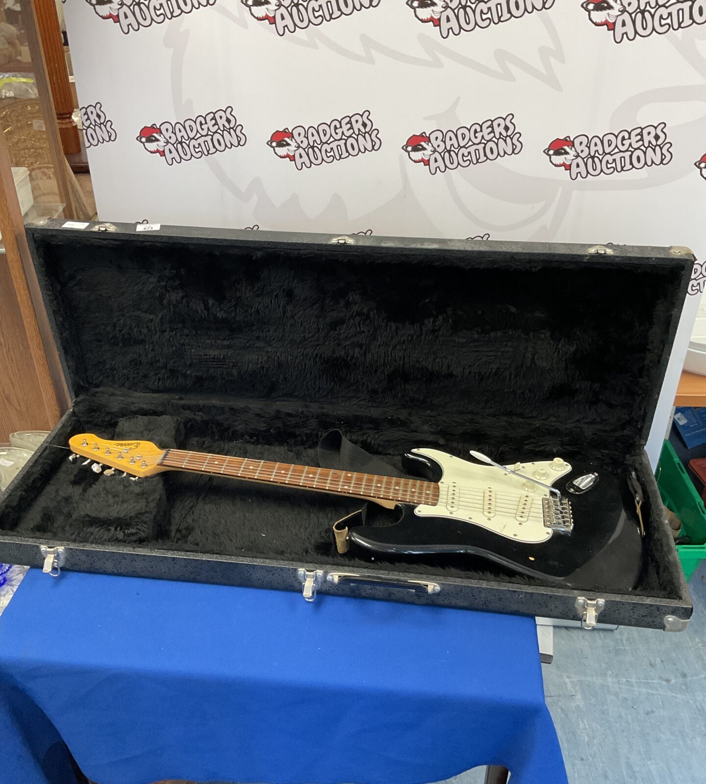 Black encore electric guitar in case