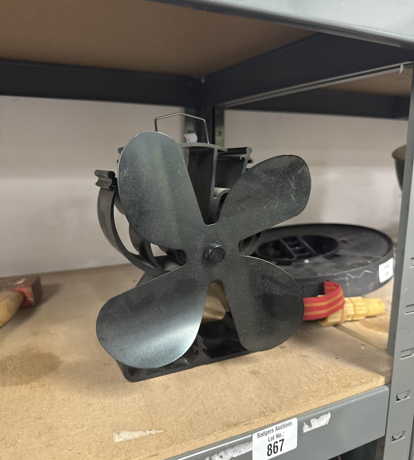 Heat spreading stove fan