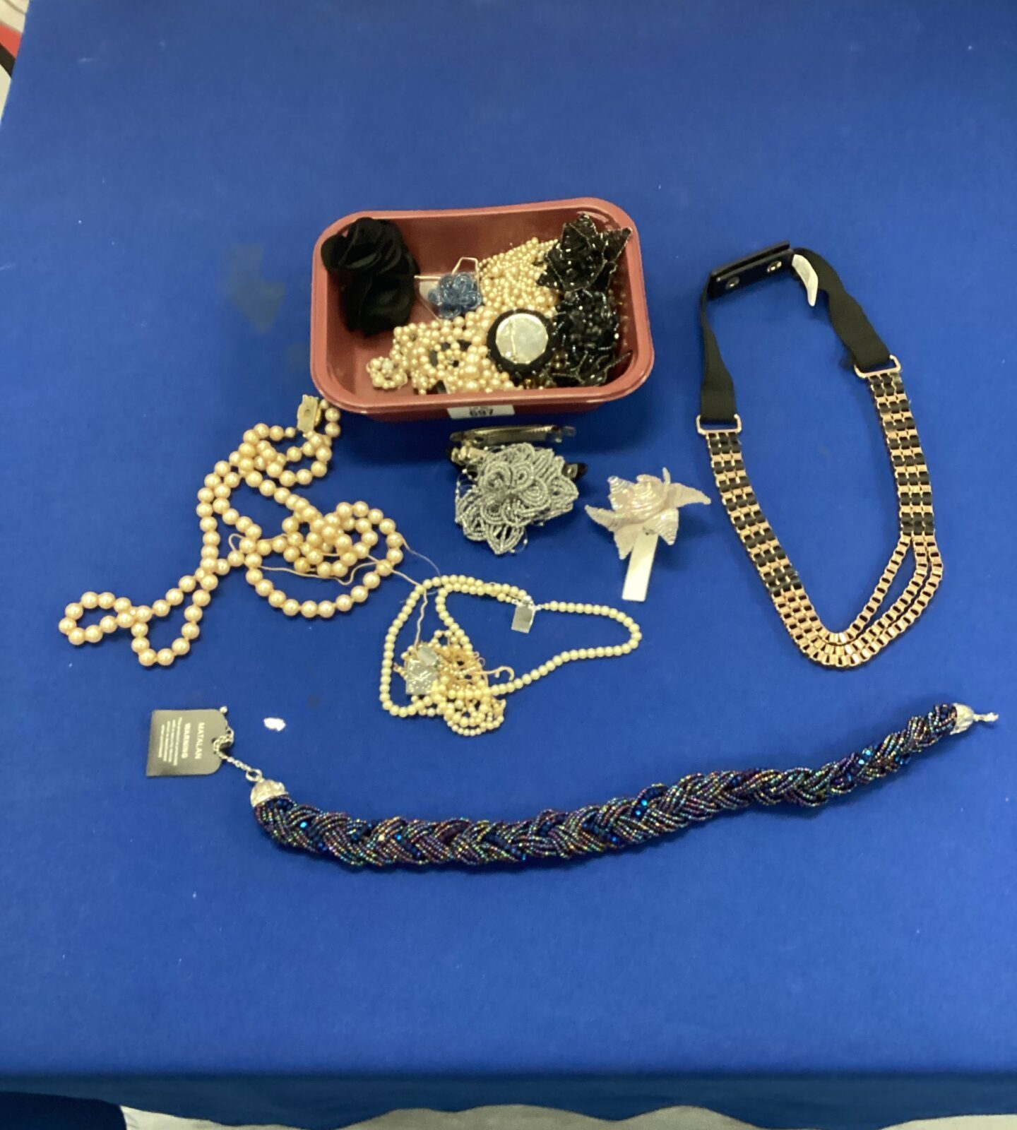 Tub of costume jewellery
