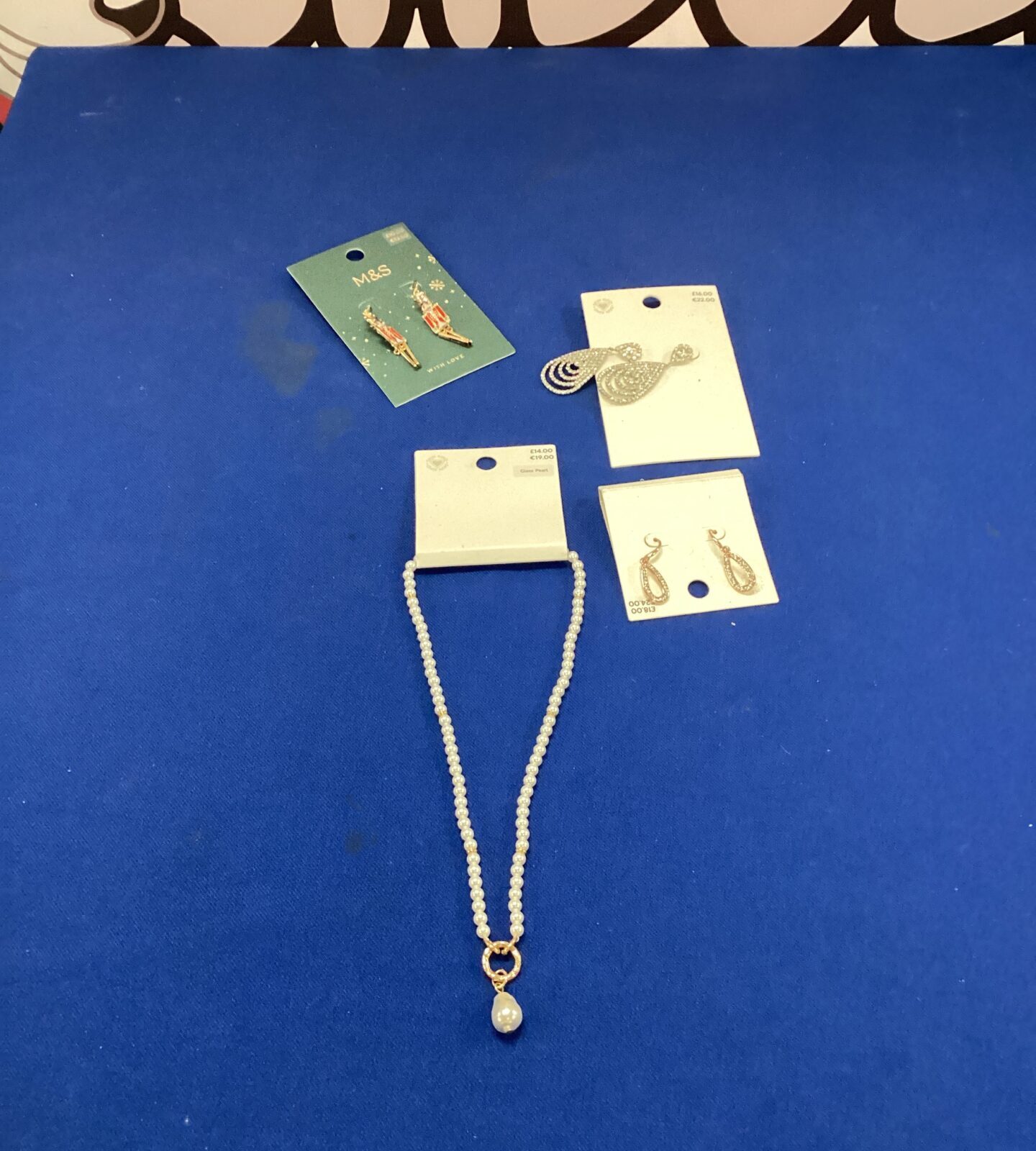 Three pairs of M&S earrings inc Christmas toy soldiers & necklace