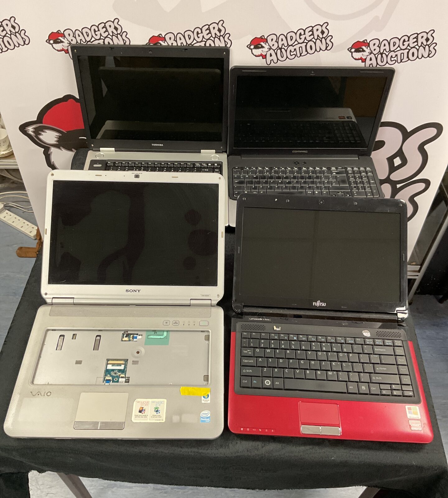 Four laptops compaq toshiba Fujitsu and Sony spares or repair