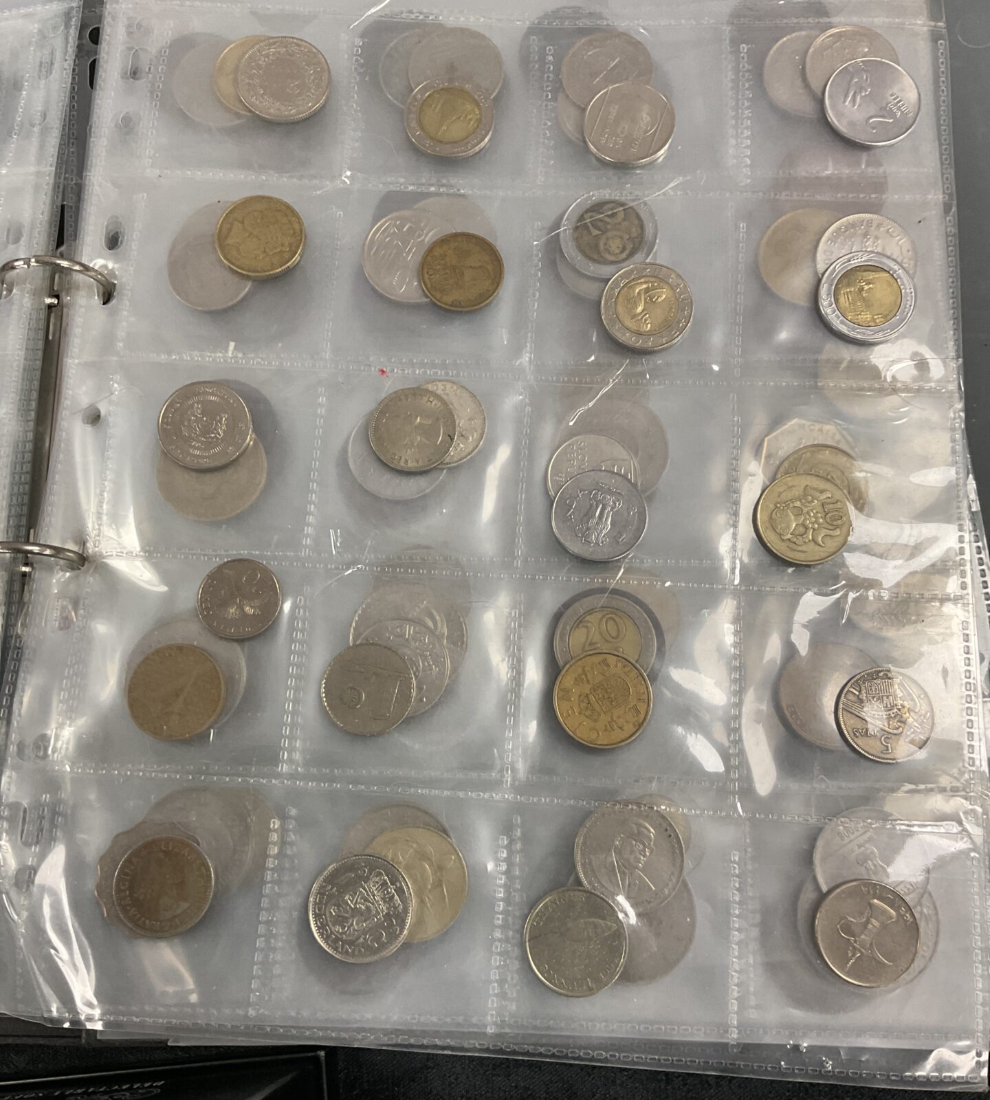 Tin of assorted coins and notes and collection of coins in collectors folder - Image 2