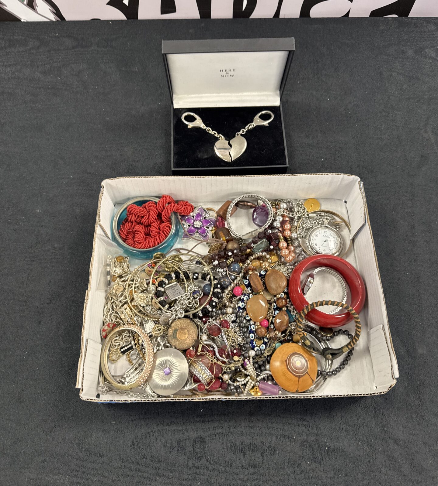 Tray of assorted costume jewellery with a his/hers heart keyring set