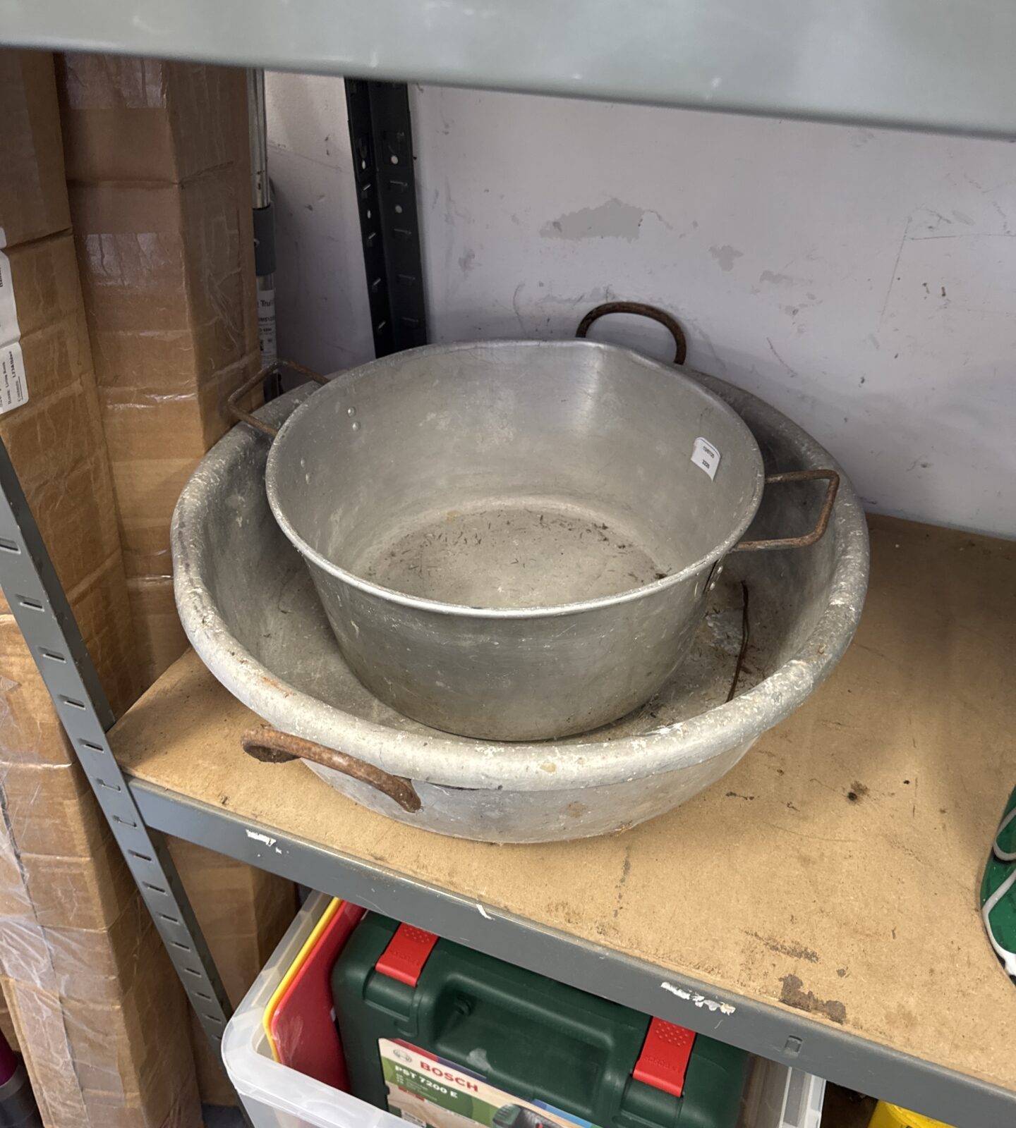 Two galvanised wash bowls