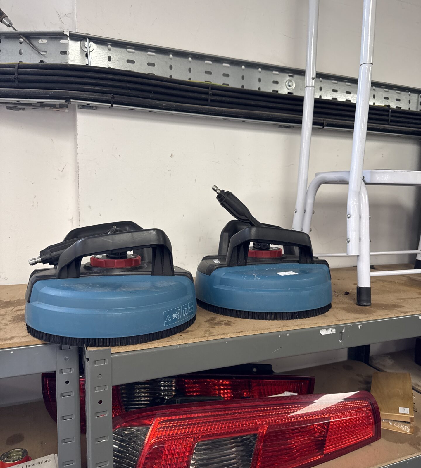 Two Erbauer pressure washer patio cleaner attachments