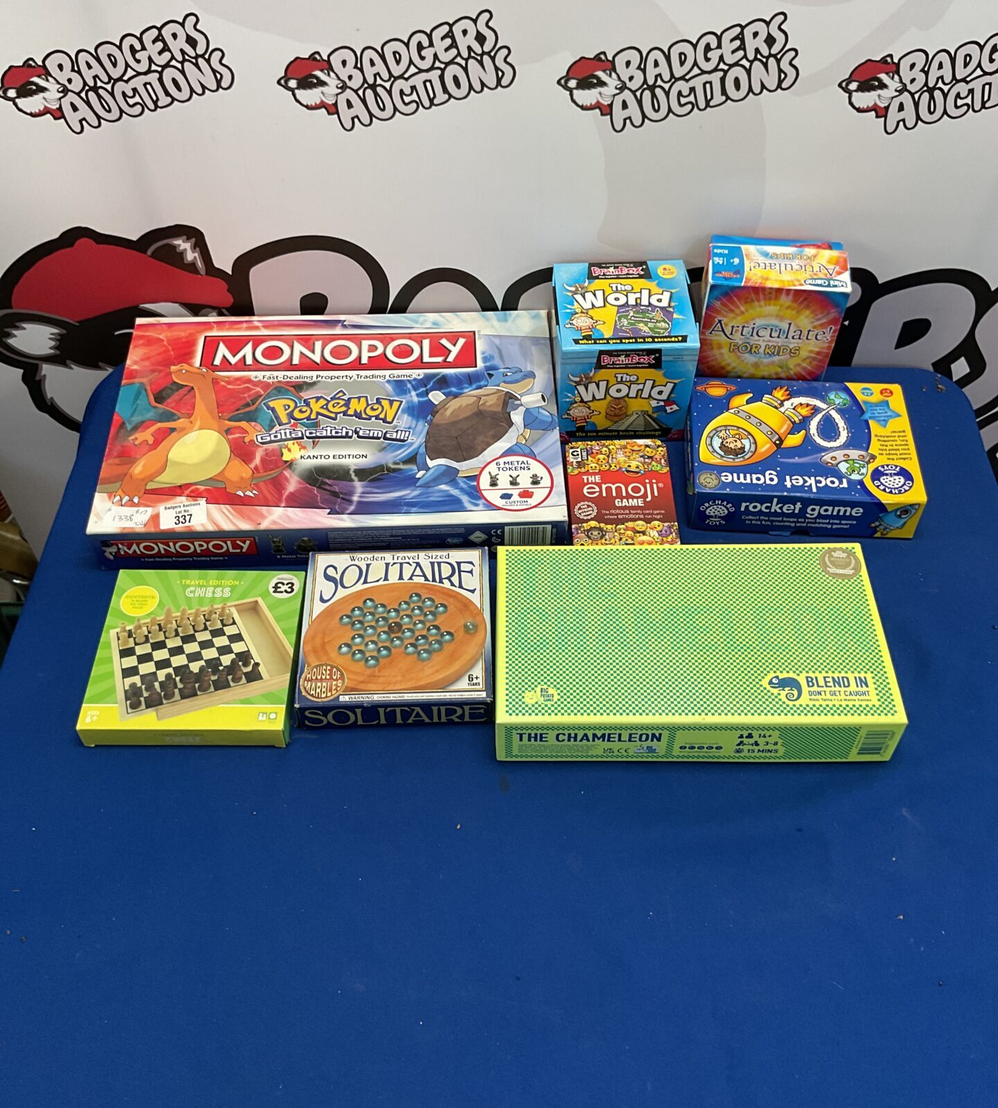 Selection of board games inc monopoly pokemon and the emoji games