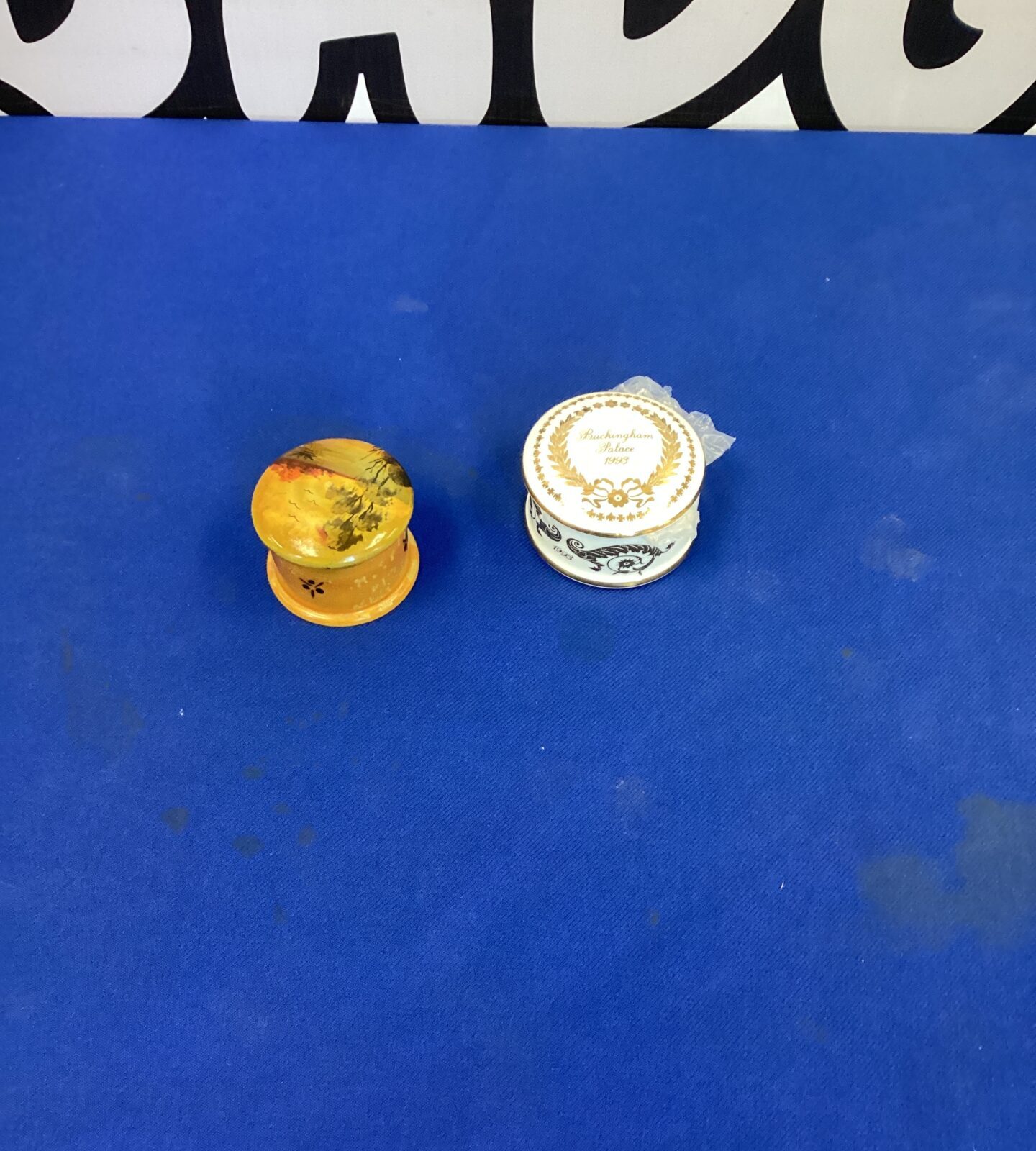 Two pill boxes inc Buckingham Palace one