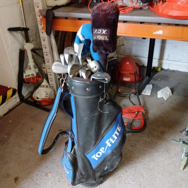 Used golf clubs in a Top Flite bag, mixed brand set.