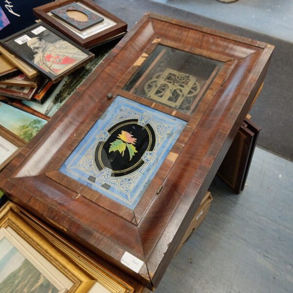 Front view of antique Jerome 30 hour clock with painted panel.