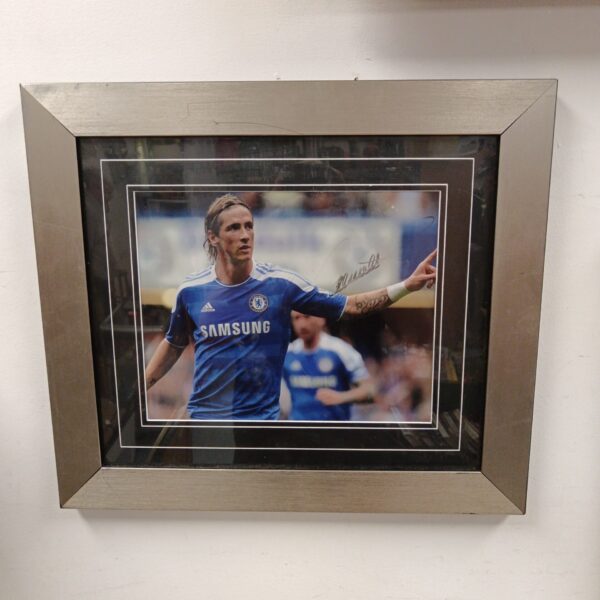 Framed signed photograph of Fernando Torres in his Chelsea kit.