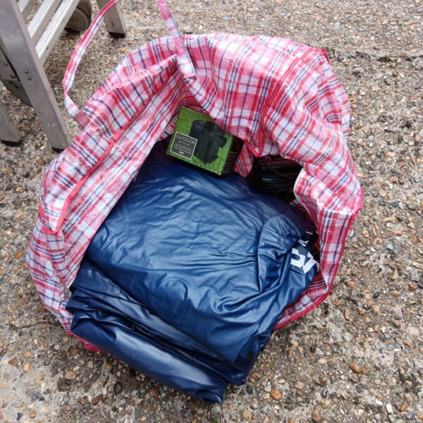 Bundle of two inflatable camp beds with pumps for outdoor use.