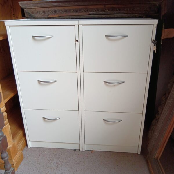 Two white wooden filing cabinets