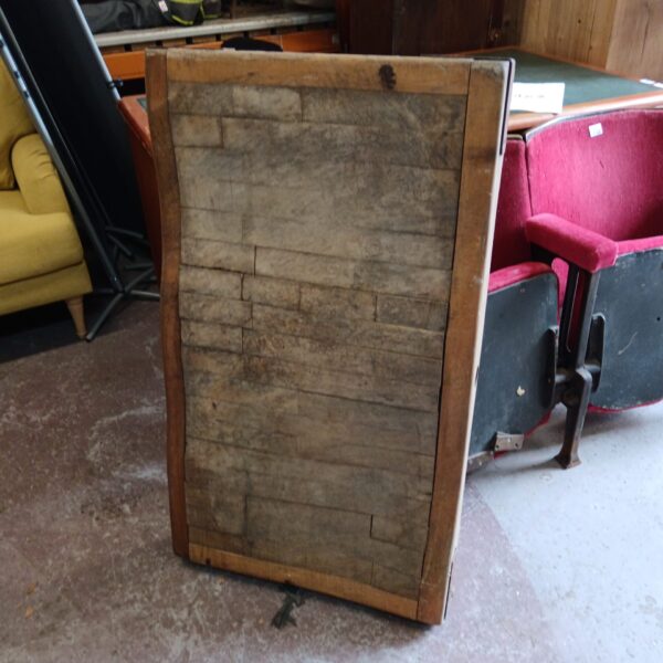 Large vintage butchers block with visible wood grain and wear.