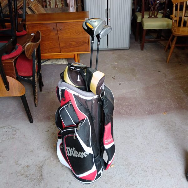 Wilson golf bag with three Wilson CGI clubs