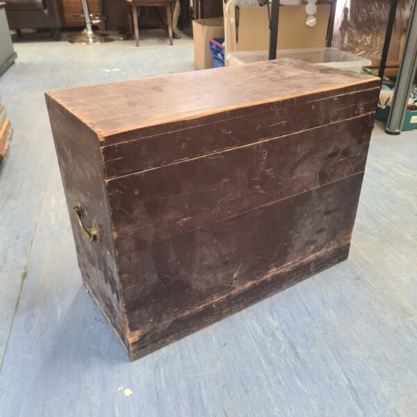 Antique oak map chest with brass handles, vintage storage solution.