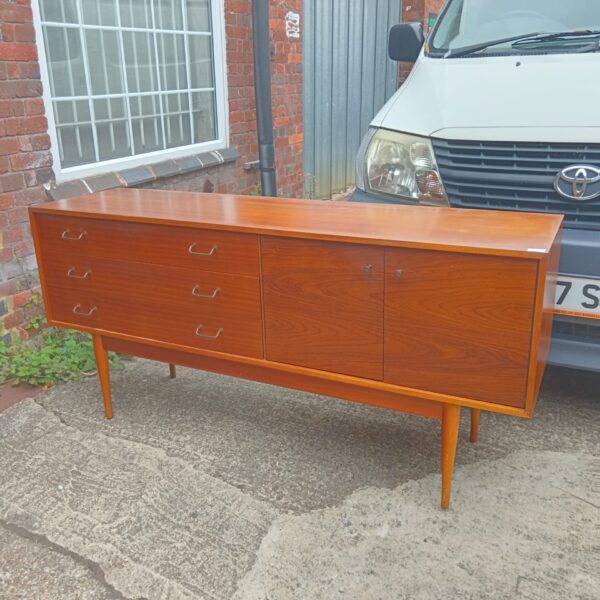 Vintage mid century teak sideboard with drawers.