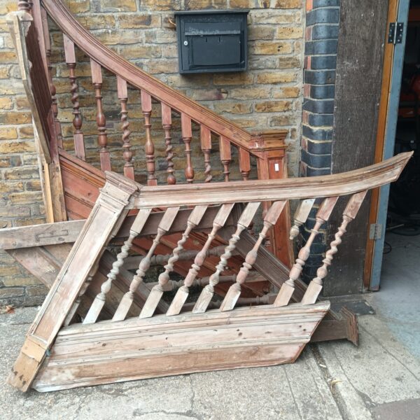 Large antique oak staircase section with turned spindles.