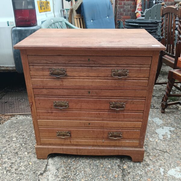Three drawer chest of drawers