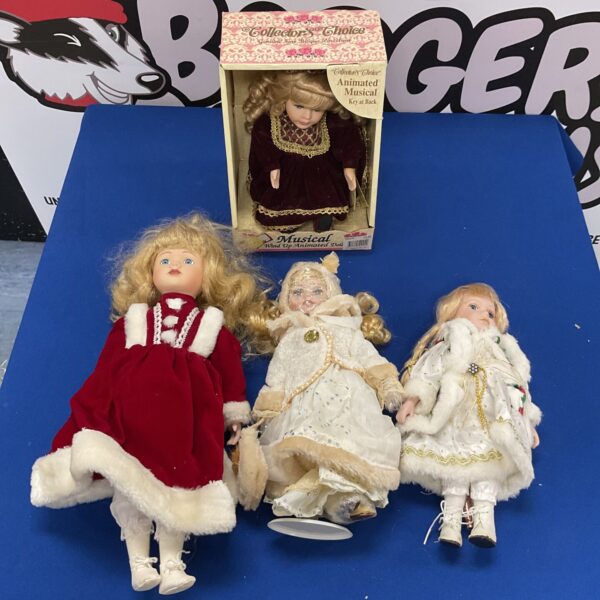 Lot of four vintage collector dolls, including a musical doll.