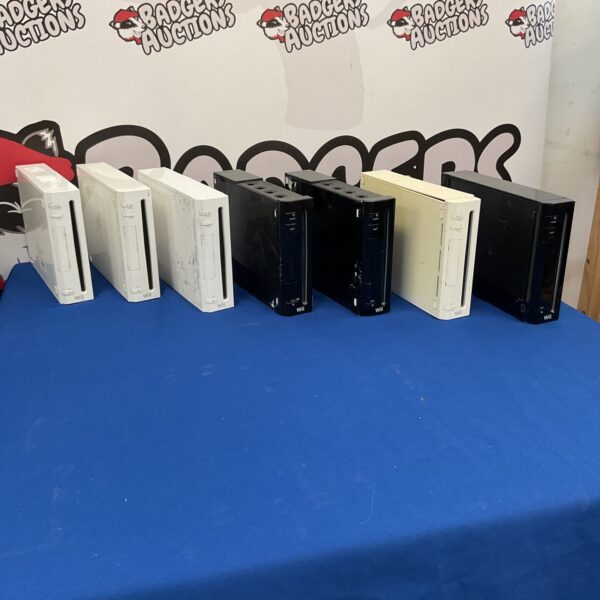 Lot of seven Nintendo Wii consoles for retro gaming collectors.