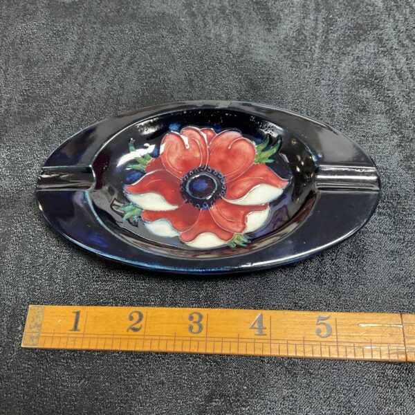 Vintage Moorcroft anemone ashtray with cobalt blue glaze.