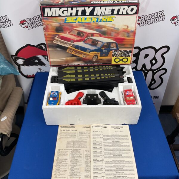 Boxed vintage Scalextric MightMetro track set for collectors.