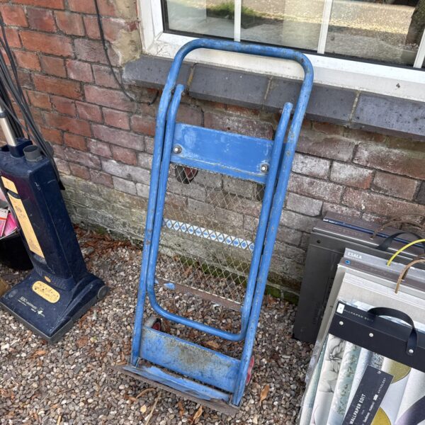Metal folding sack barrow, side view, garden tool.