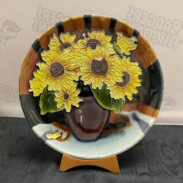 Vibrant majolica sunflower wall plate, vintage studio pottery.