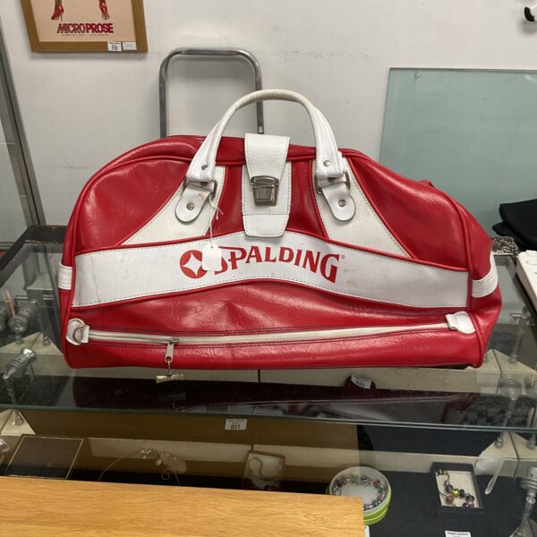 Vintage Spalding leather holdall, brown sports bag with handles.
