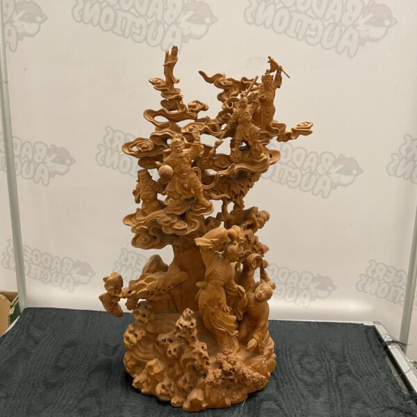 Detailed Chinese camphor wood carving of Guan Yu and other figures.