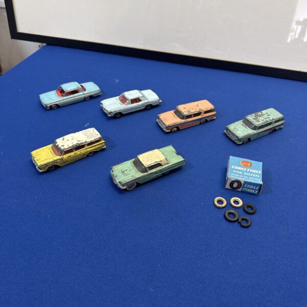 Vintage Dinky Toys lot with Corgi tyres, collectible diecast cars.
