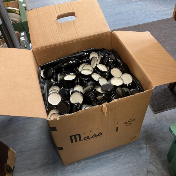 Large box full of jar lids