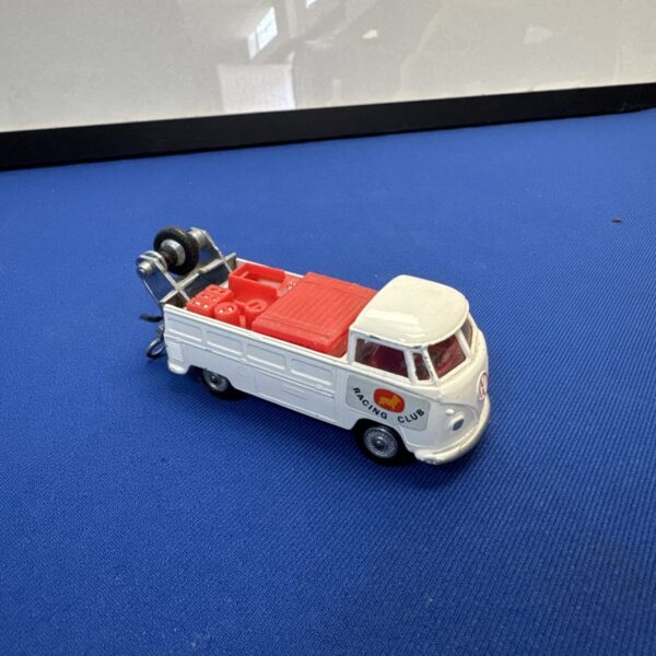 Side view of vintage VW Racing Club tow van diecast toy.