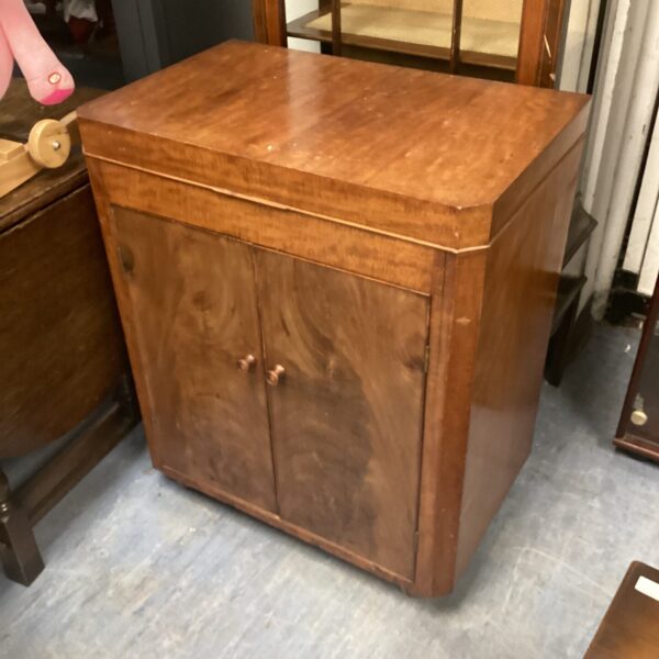 Vintage mahogany cutlery canteen cabinet for silverware storage.