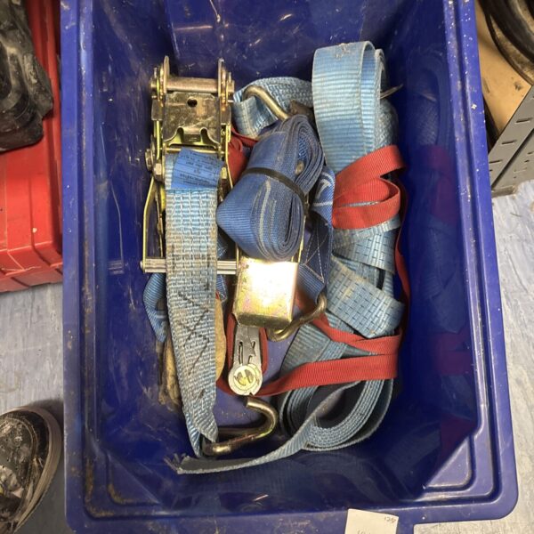 Used ratchet straps for securing cargo and vehicle tie downs.