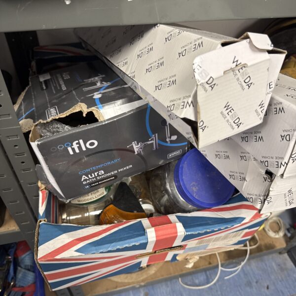 Assorted clearance lot with various household items and packaging.