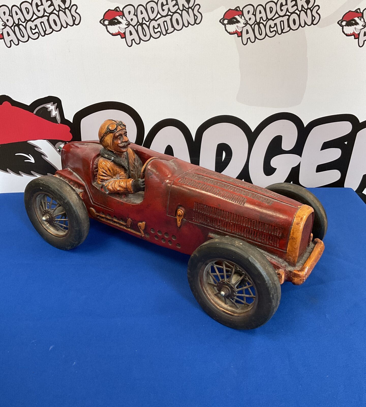 Large fibreglass model of a classic race car