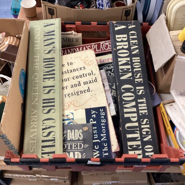 Crate of vintage homely signs including a castle sign.