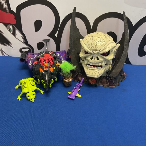 Vintage MightyMax Skullmaster and Dreadstar playsets with figures and accessories.