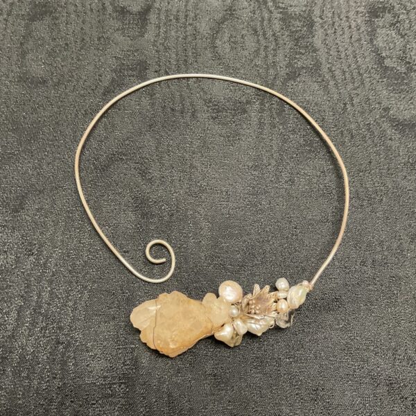 Vintage silver necklace with a large rock crystal pendant.